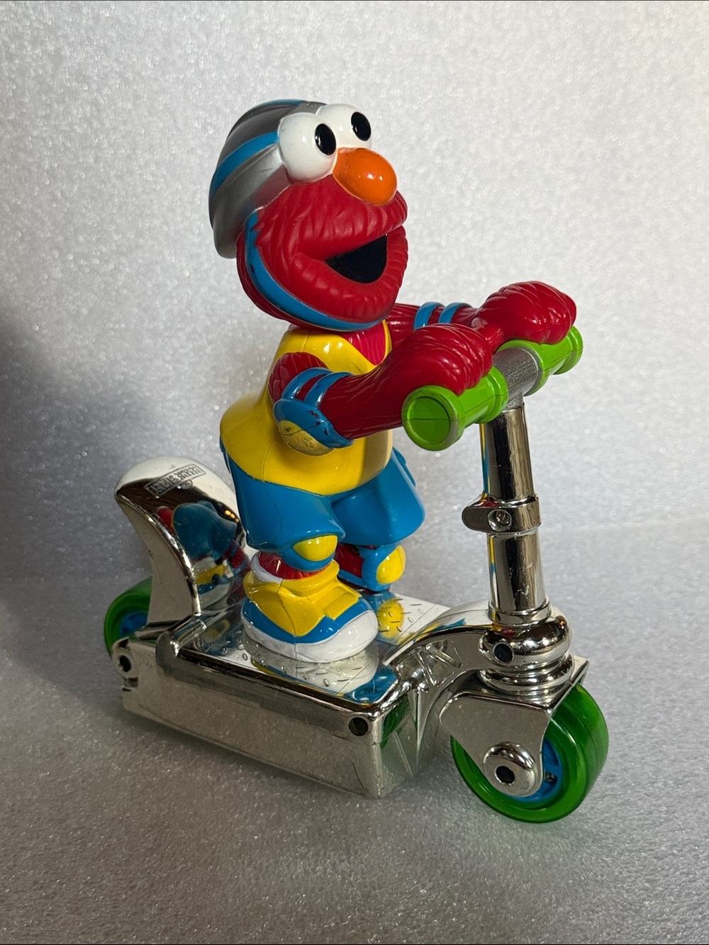 Vintage Sesame Street Elmo Figure on Chrome Scooter - Pull Back N Go 8.5” tall